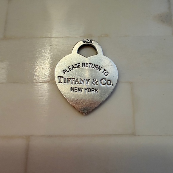 Tiffany & Co. Sterling Silver Rerun to Tiffany Charm - Picture 1 of 4